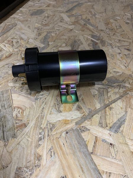Котушка запалювання Audi 801.6-2.2 L (>88) VW Golf 2/T-2 1.6-2.0 L кругла Topran 211905115D 211905115D фото